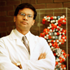 Researcher with arms folded, portrait