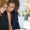 Young couple using laptop