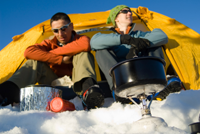 USA, Washington State, Cascade Mountains, two hikers resting in front of tent in mountains
