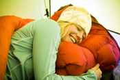 Young women winter camping in the snow